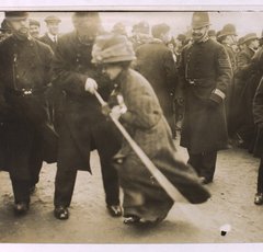 Photo of a Suffragette being arrested on Black Friday