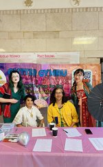 Image taken at Glitter Pride 2024, Jien Teh, Shana Parvin, Numair Masud and Mica Soft seated at table.