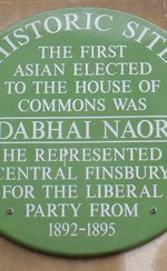 Green plaque commemorating the election of Dadabhai Naoroji to the House of Commons