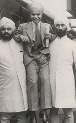 Photo of Sabu and his bodyguards leaving for New York