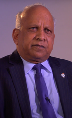 Headshot of John Raghoobar