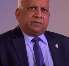 Headshot of John Raghoobar