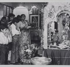 Photograph of people praying at Hindu Temple